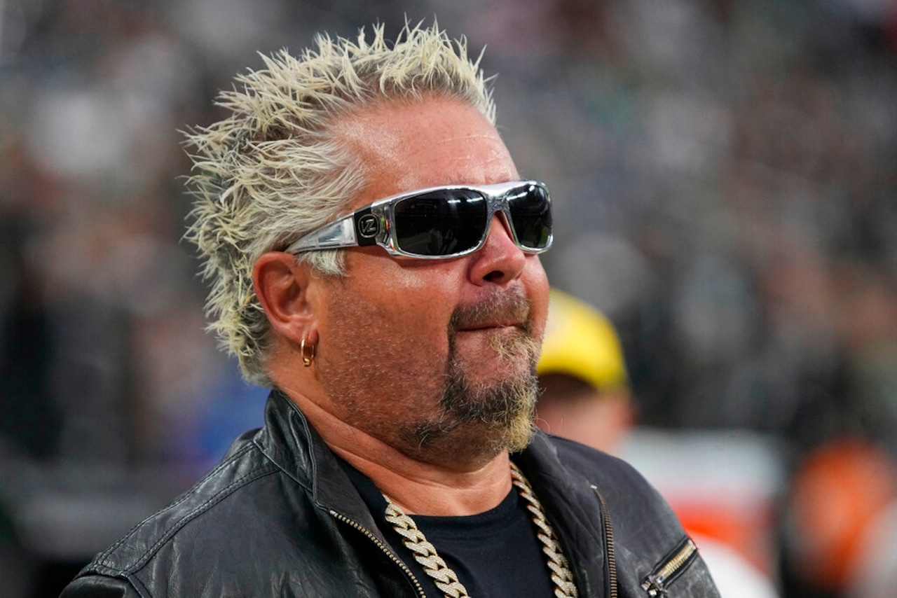 Guy Fieri spoke with raw emotion, sharing that his family is in